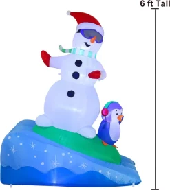 Joiedomi 6ft Tall Inflatable Snowman Snowboarding -Christmas Ornaments Sales Store 6ft Snowboarding Snowman with A Penguin Inflatable 3 result 600x674 1
